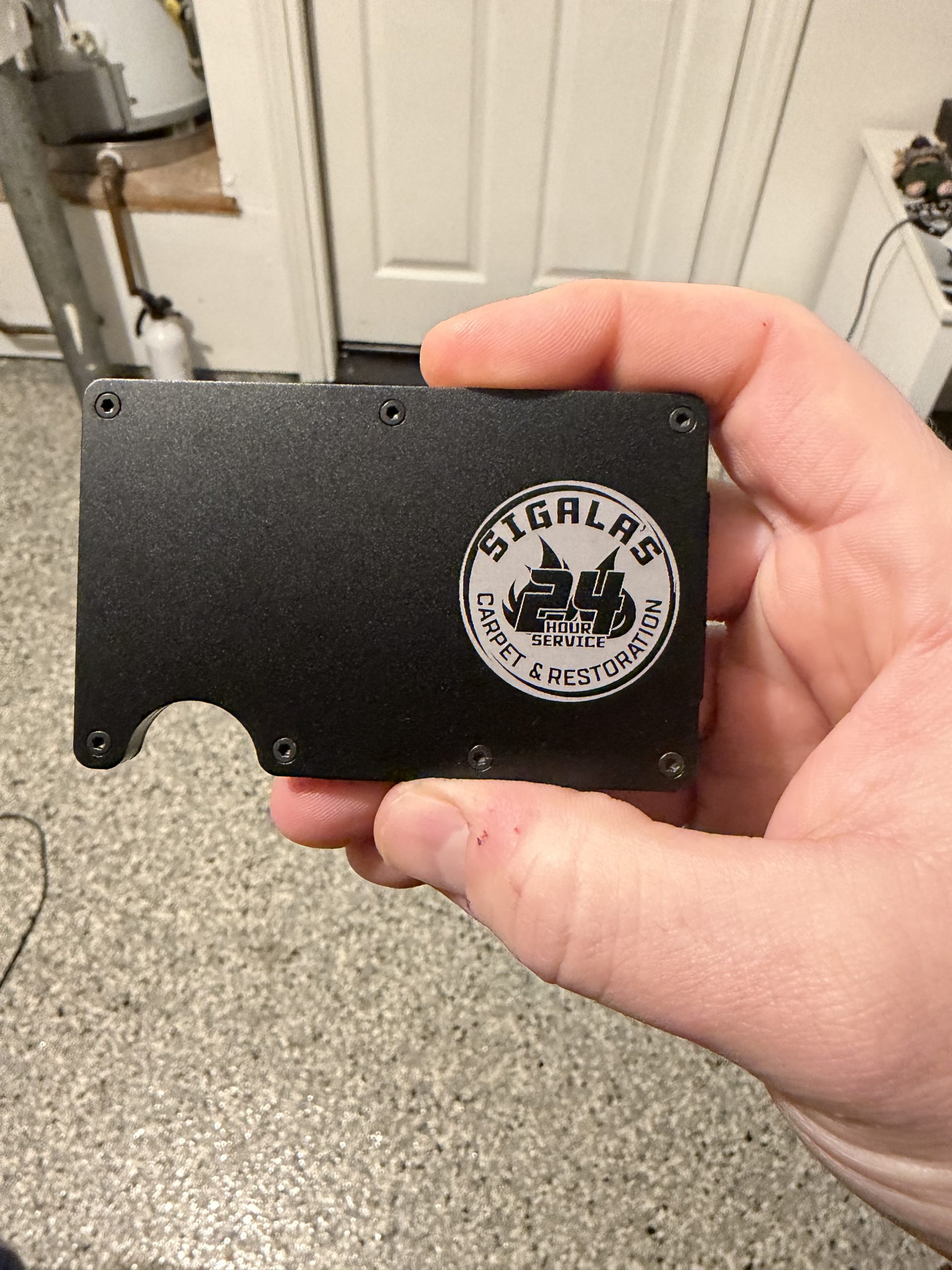 Custom engraved metal wallet with company logo