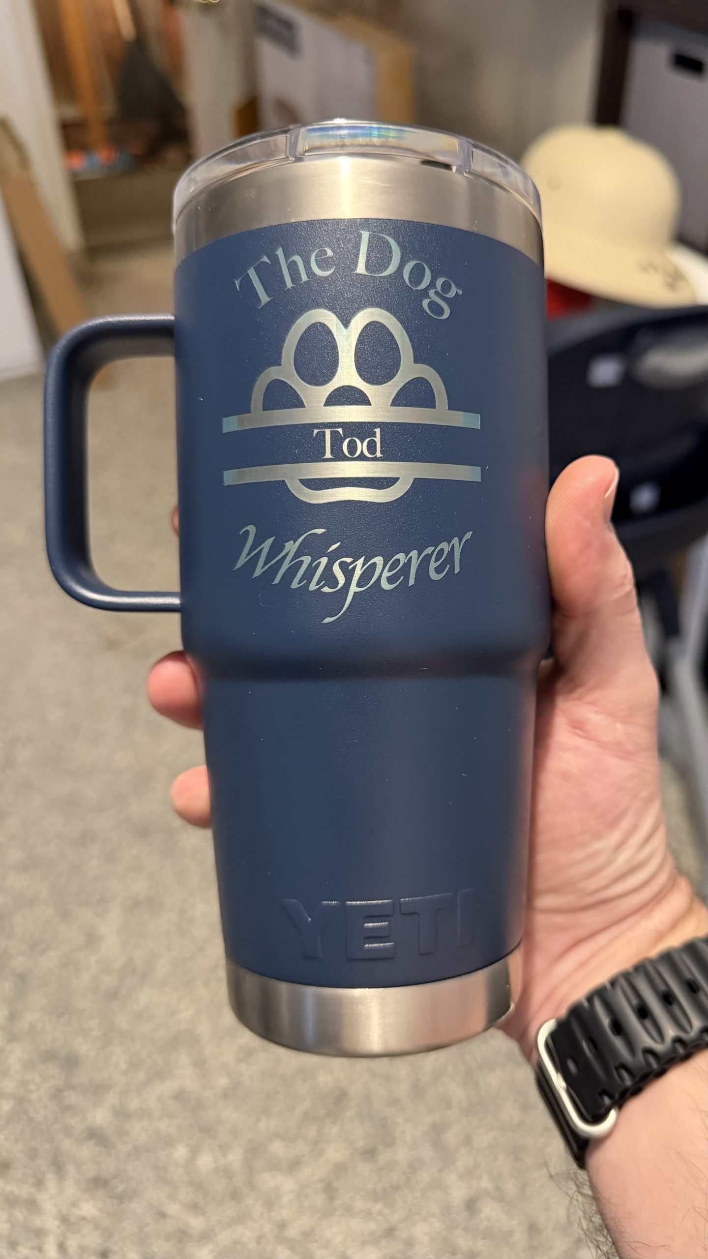 Close-up custom engraved blue tumbler