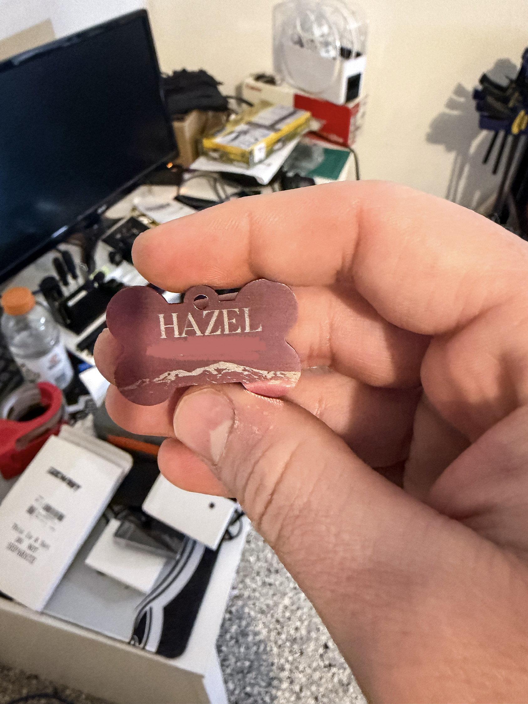 Custom engraved metal dog tag with name and phone number